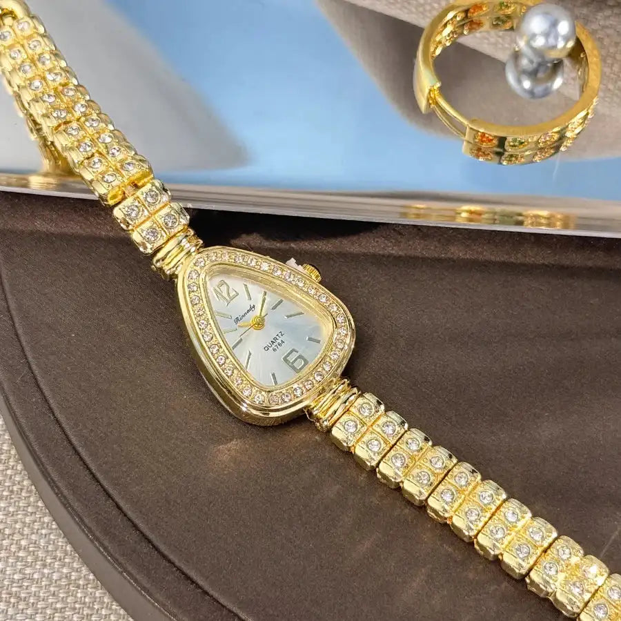 Women's diamond-set snakehead alloy case Sun stripe stripe scale diamond-set fine bracelet quartz watch luxury women's watch LuxVrouw